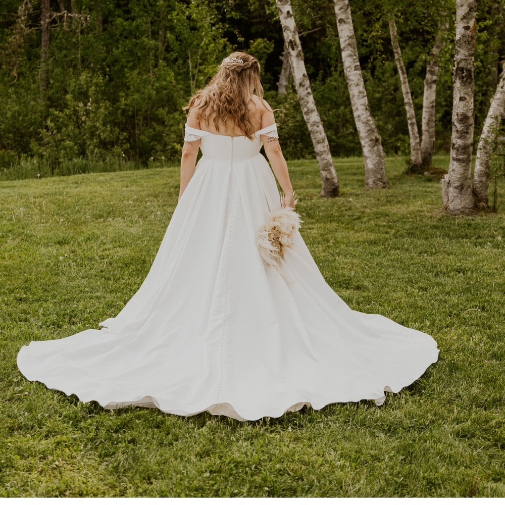 Madison James wedding dress with removable sleeves.